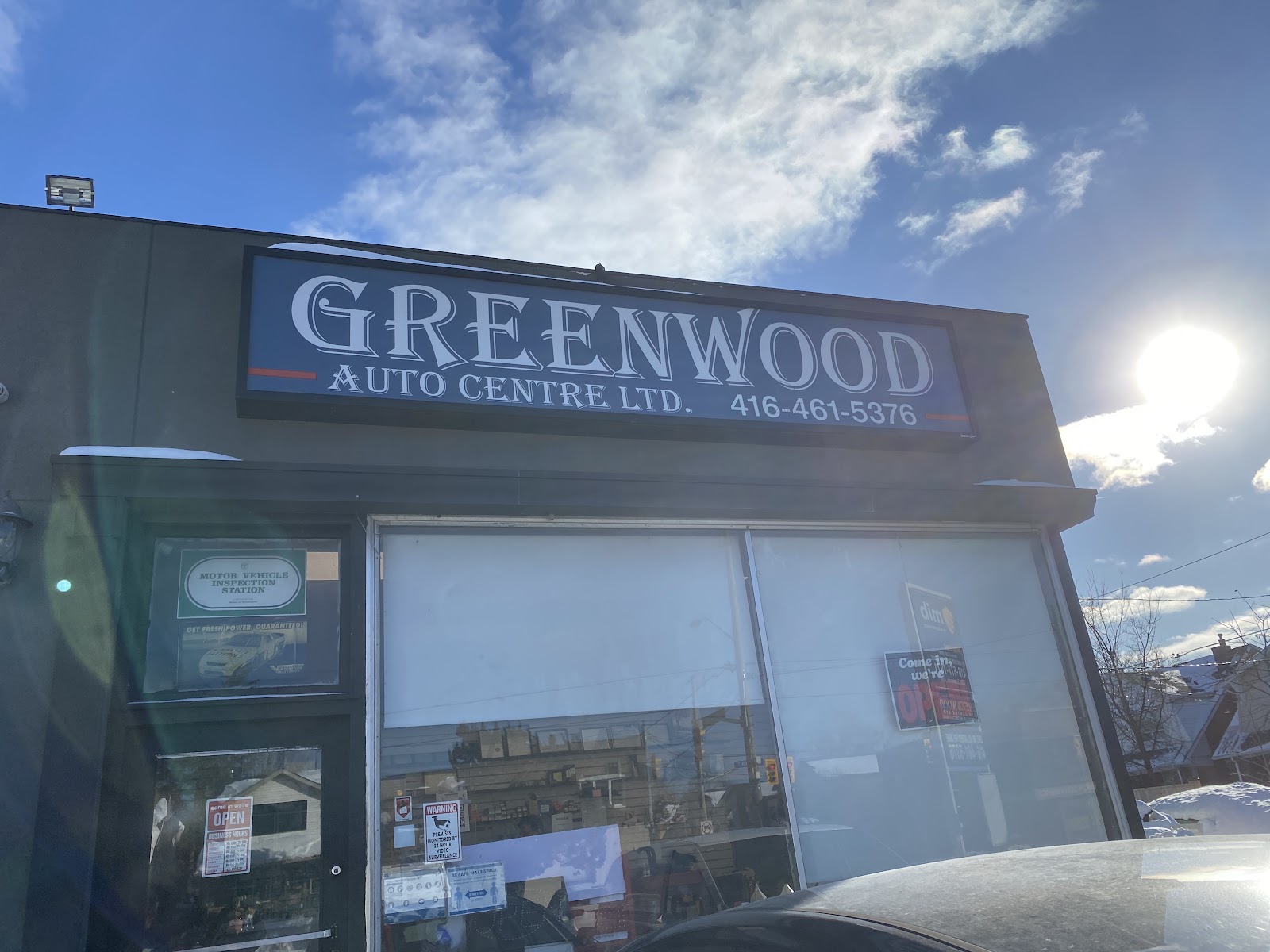 The Greenwood Auto Centre sign on Sammon Ave, East York